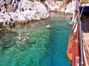 Swimming in a cove from the gulet in Turkey